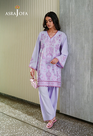 Asra Jofa ASAE-01 lavender embroidered cambric 2-piece suit – model looking down, side pose