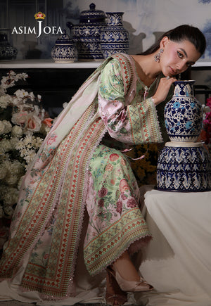 Asim Jofa AJCS-01 mint green floral printed charmeuse silk suit – seated view with silk dupatta beside blue and white vases