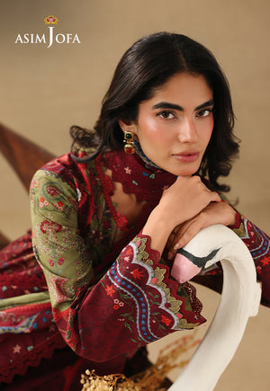 Asim Jofa AJUBC-09 maroon printed lawn shirt – leaning portrait beside a white swan prop, highlighting patterned cuffs