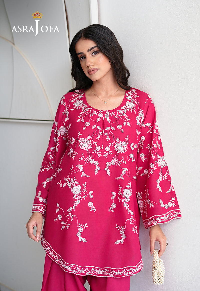 Asra Jofa ASAE-07 hot pink embroidered cambric kurta close-up with white all-over floral embroidery, round neckline and tassel tie detail
