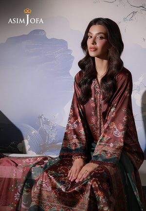 Asim Jofa AJCS-02 chocolate brown printed charmeuse silk shirt – seated portrait highlighting floral sleeves and teal cuffs