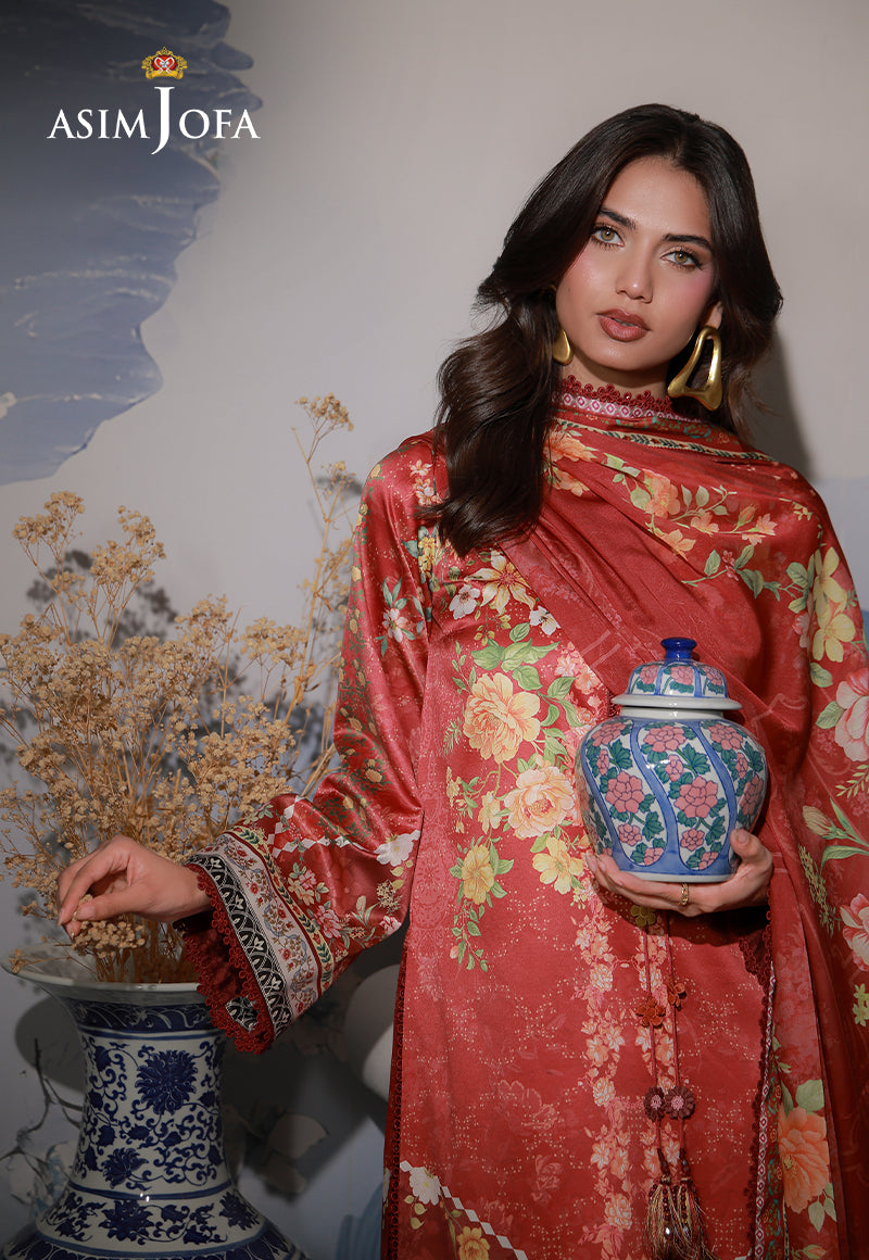 Asim Jofa AJCS-03 red-orange printed charmeuse silk shirt – portrait with floral silk dupatta and model holding a ceramic jar