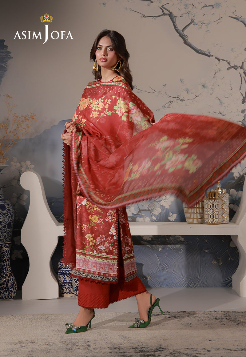 Asim Jofa AJCS-03 red-orange printed charmeuse silk suit – full-length walking pose with flowing floral silk dupatta