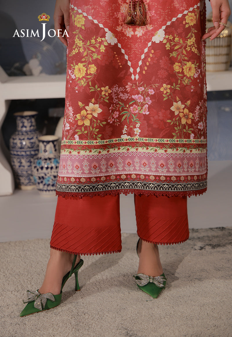 Asim Jofa AJCS-03 red-orange printed charmeuse silk suit – hem close-up showing floral borders and raw silk trousers