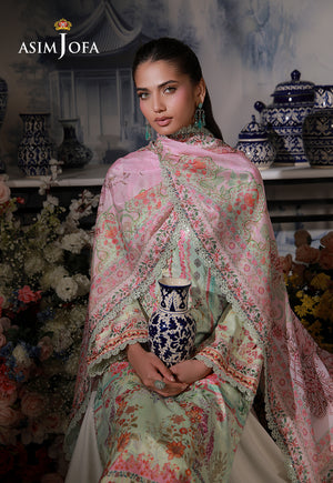 Asim Jofa AJCS-07 mint green floral printed charmeuse silk suit – front portrait with model holding a blue and white vase