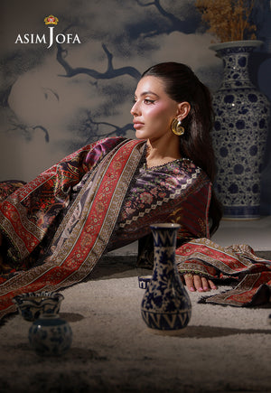 Asim Jofa AJCS-09 purple printed charmeuse silk suit – reclining side portrait with red-bordered dupatta beside ceramic vases