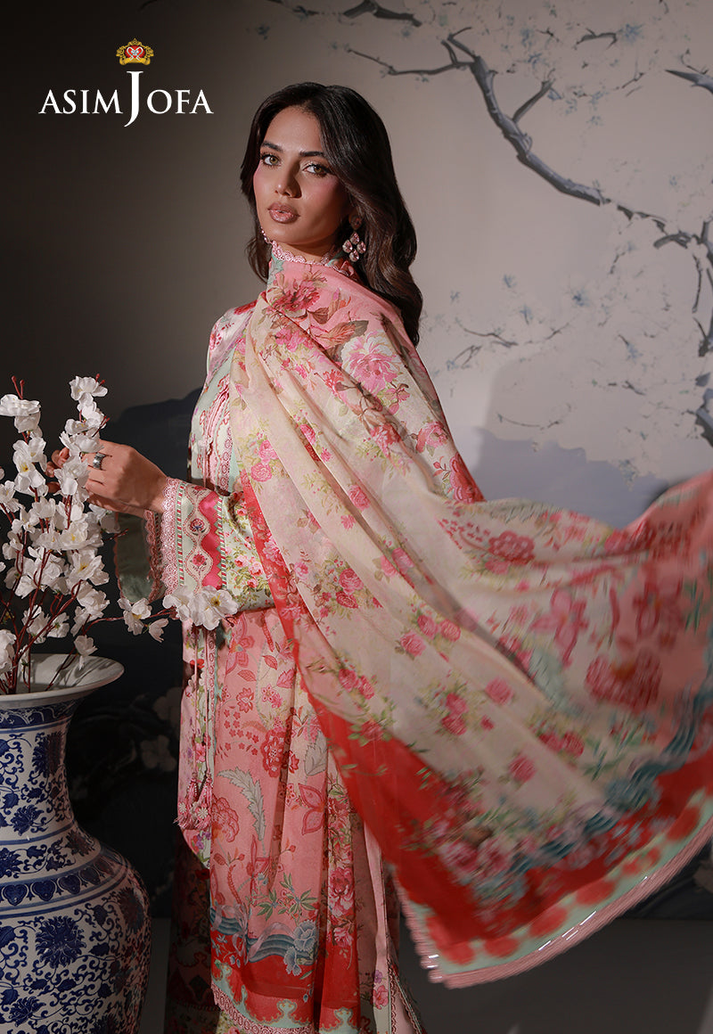 Asim Jofa AJCS-10 peach printed charmeuse silk suit – angled portrait showing flowing rose-print silk dupatta and coral border