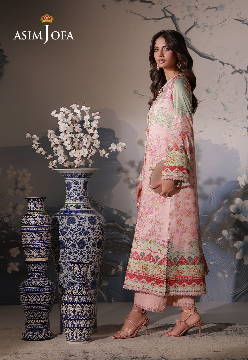 Asim Jofa AJCS-10 peach floral printed charmeuse silk suit – full-length side view with pink raw silk trousers and clutch