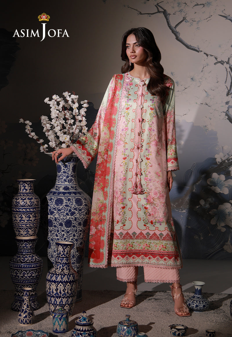 Asim Jofa AJCS-10 peach printed charmeuse silk 3-piece suit – full-length front view beside blue and white ceramic vases