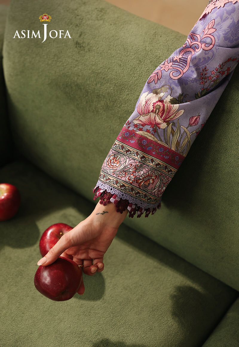 Asim Jofa AJUBC-06 lilac floral printed lawn sleeve – close-up of patterned cuff and burgundy trim with hand holding an apple