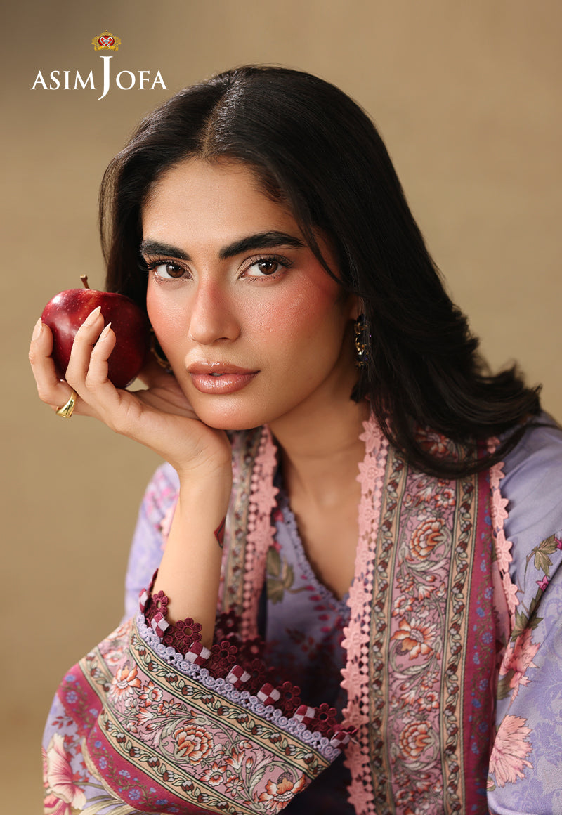 Asim Jofa AJUBC-06 lilac printed lawn suit – portrait close-up of patterned cuff and pink dupatta border, with a red apple