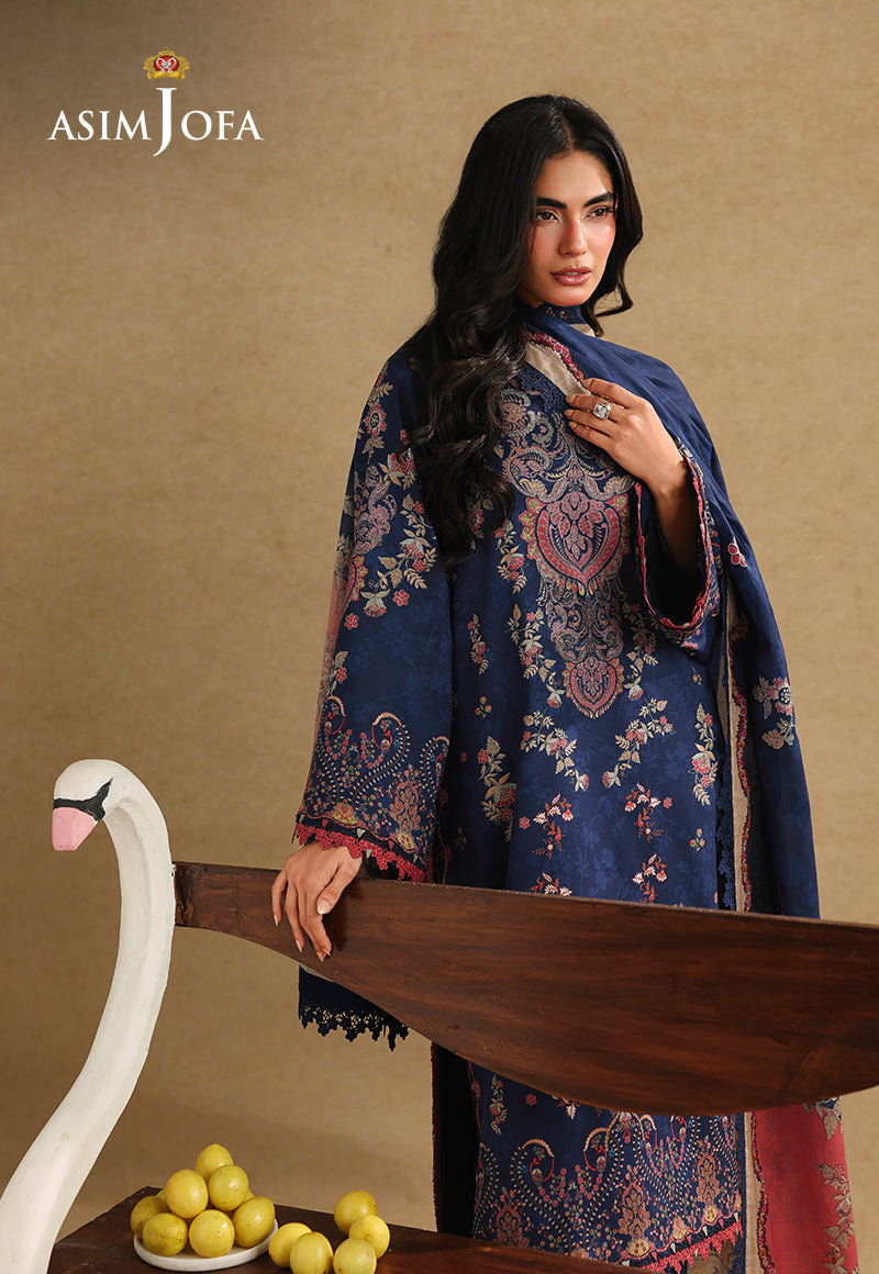 Asim Jofa AJUBC-10 navy blue printed lawn shirt – front view behind a swan bench, showing floral and paisley motifs