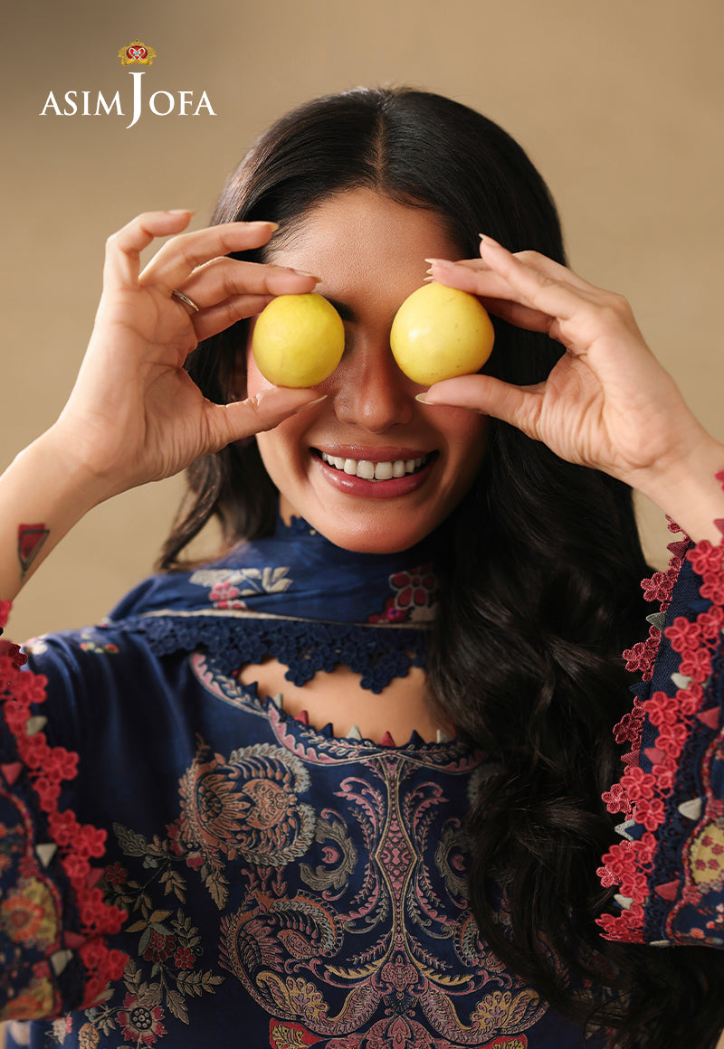 Asim Jofa AJUBC-10 navy blue printed lawn shirt – close-up of ornate neckline with model holding lemons over her eyes