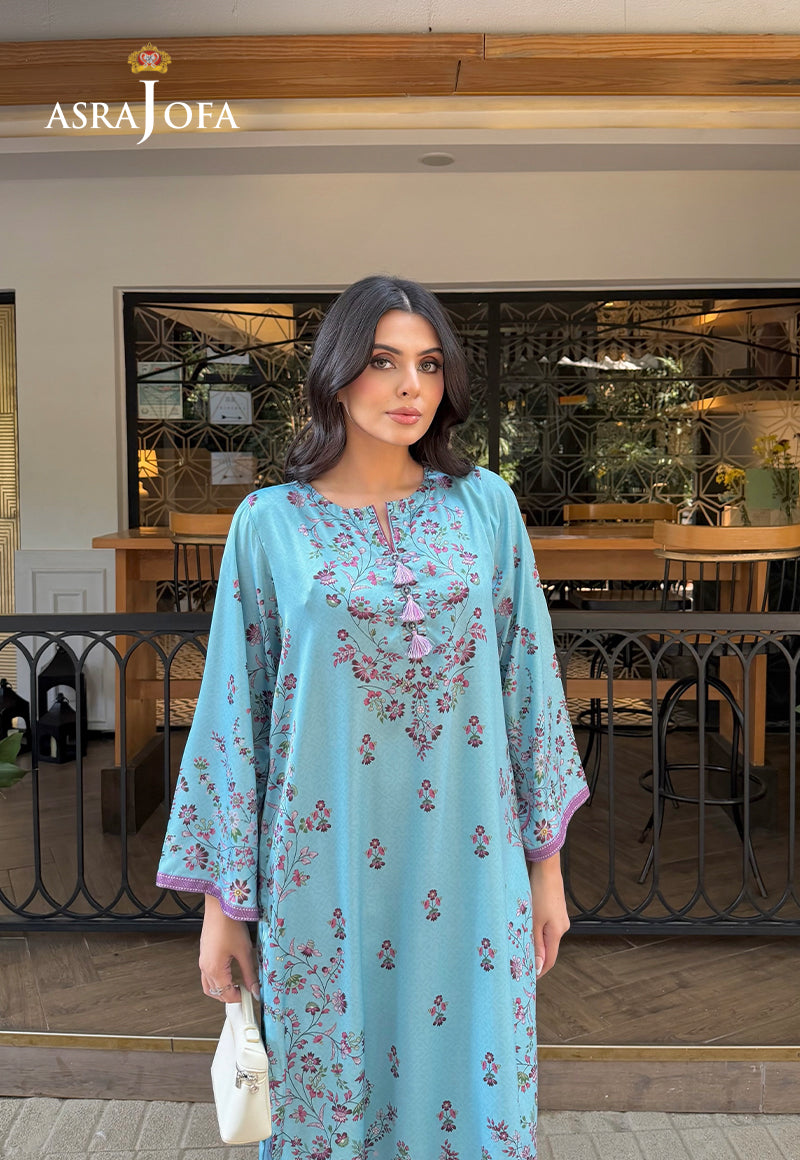Asra Jofa ASPS-01 pastel silk pret co-ord – front portrait showing ice blue floral shirt with wide sleeves and lilac trim